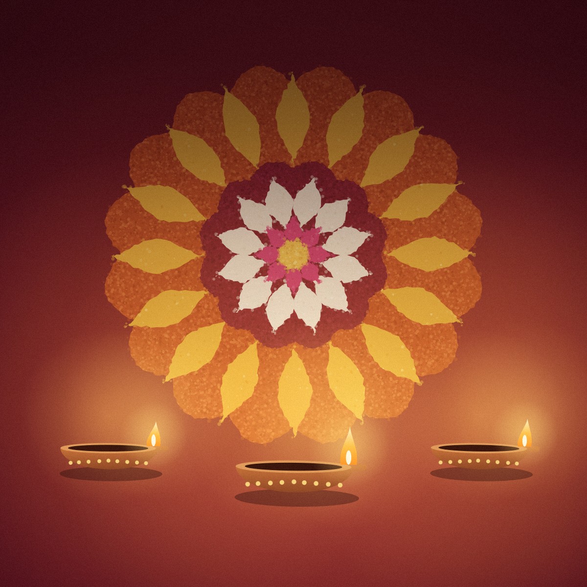 Three lit clay diyas glowing in front of a colorful rangoli for Diwali
